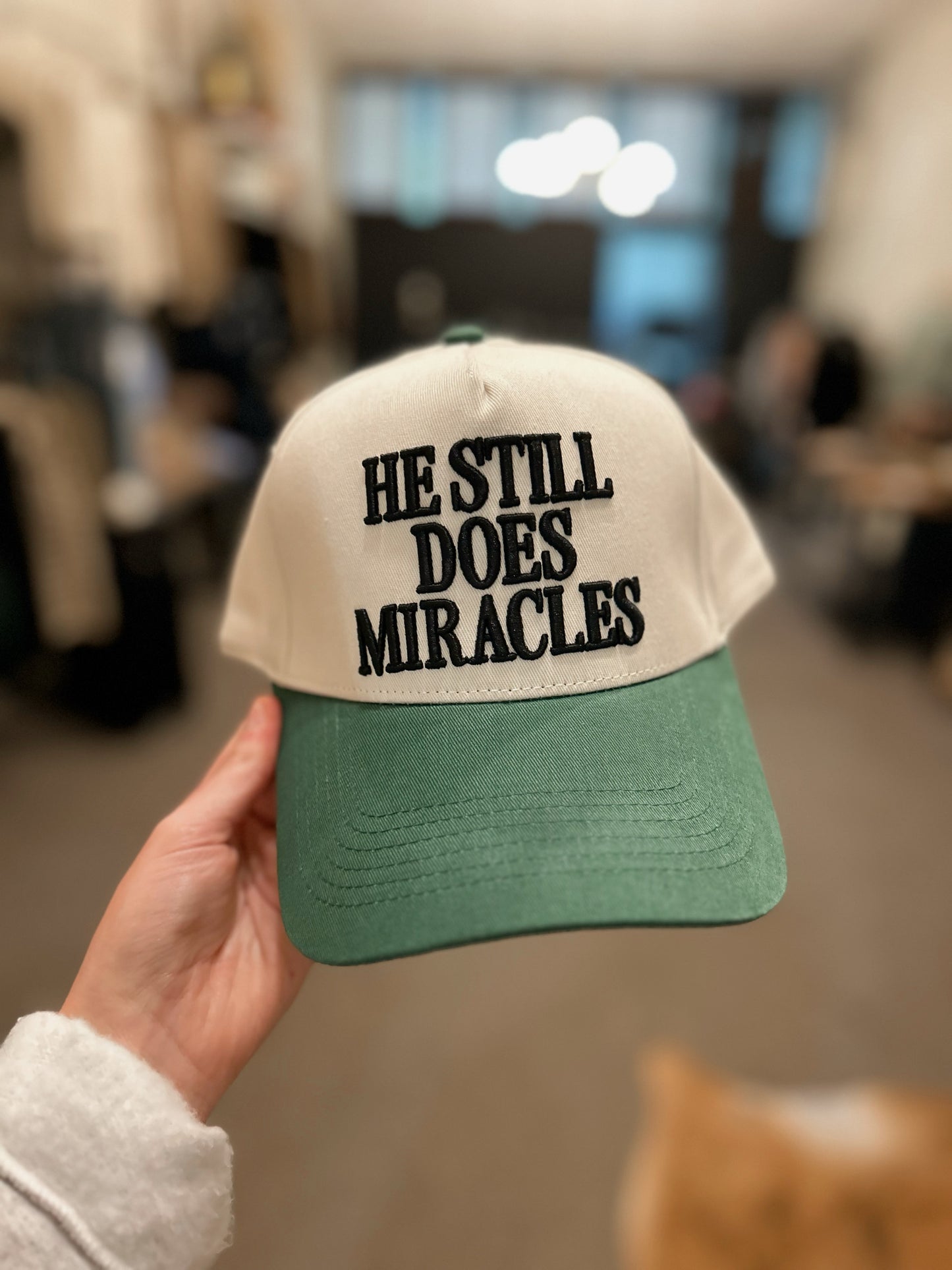 HE STILL DOES MIRACLES Embroidered Trucker Hat